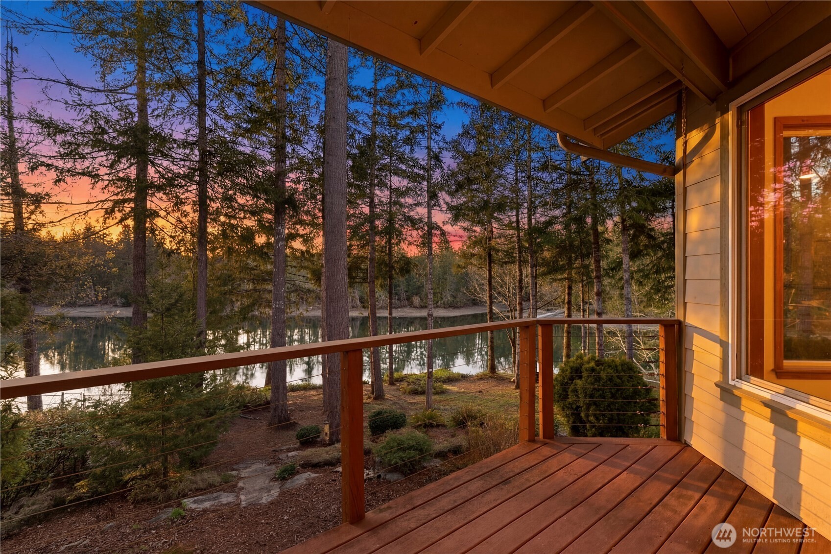 730 Southeast Nelson Road Shelton, WA 98584 - Photo 6 of 40 a view of a balcony with wooden floor
