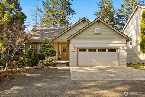 a front view of a house with a garage