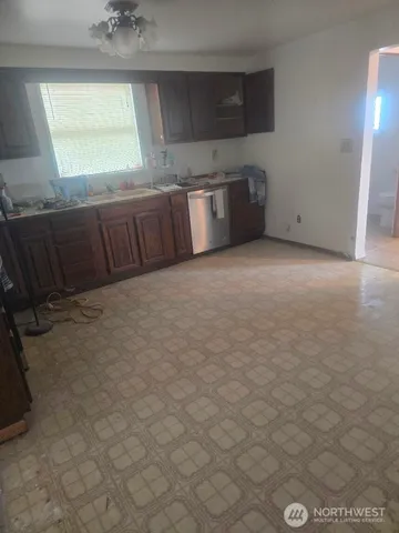 a view of a kitchen with a sink