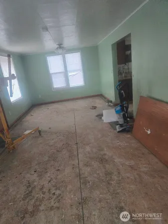 an empty room with windows