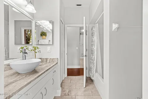 $400,000 | 676 Sheridan Woods Drive, Melbourne, FL 32904
