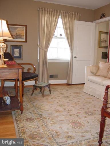 6904 Avondale Road Baltimore, MD 21212 - Photo 3 of 30 a living room with furniture and a window