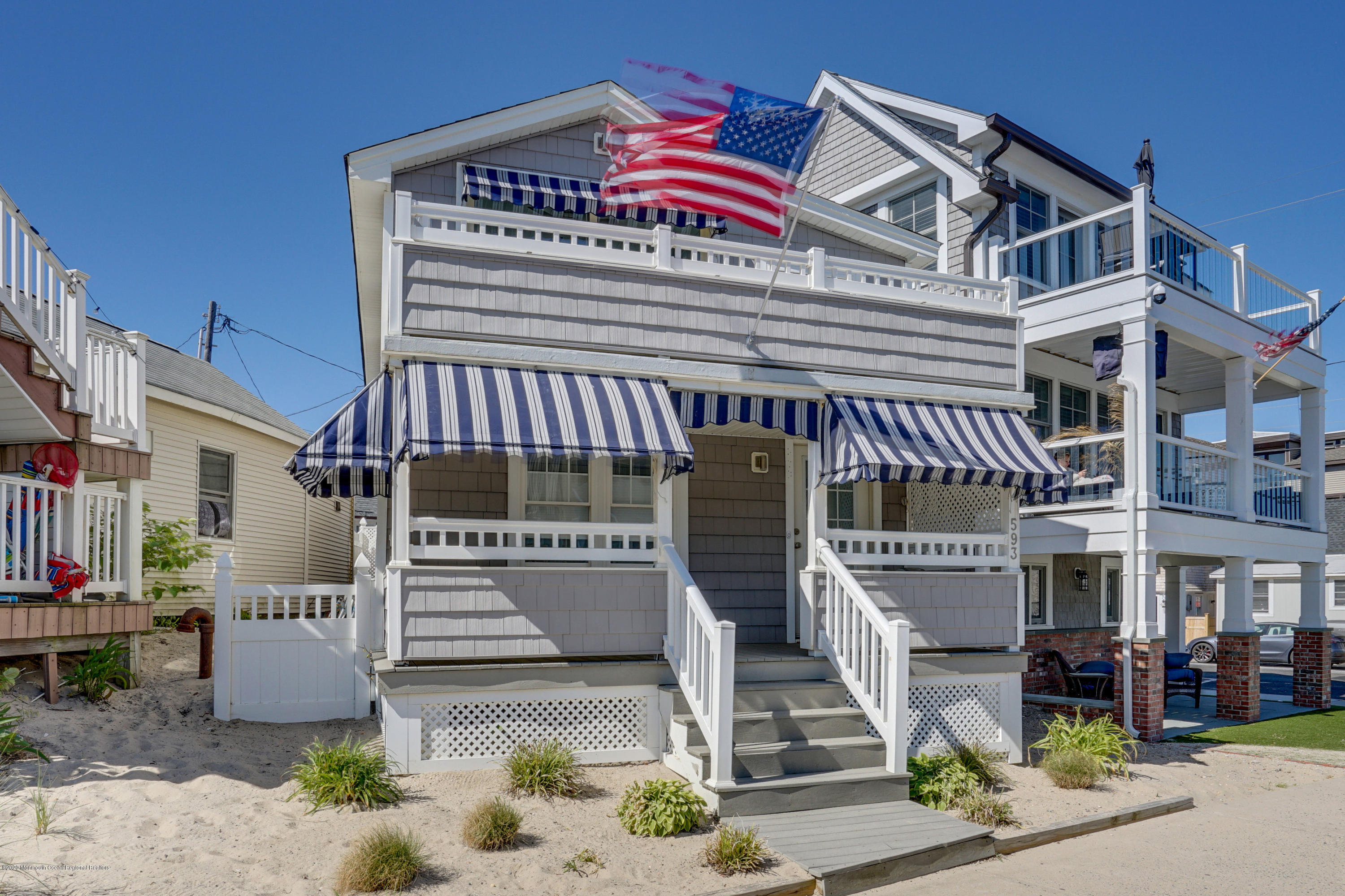 593 Brielle Road Manasquan, NJ 08736 - Photo 1 of 39 a front view of a building with street