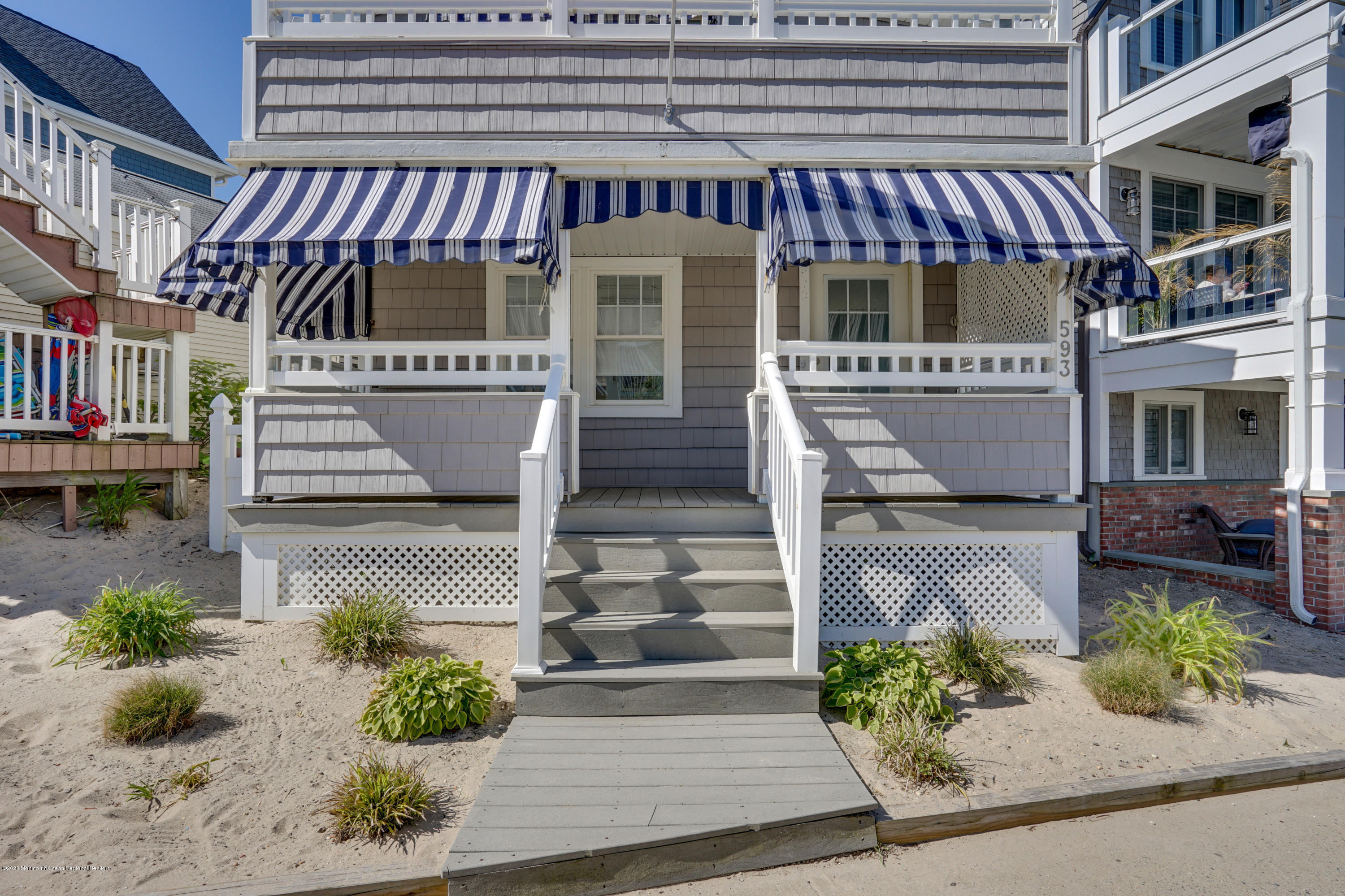 593 Brielle Road Manasquan, NJ 08736 - Photo 2 of 39 a front view of a house