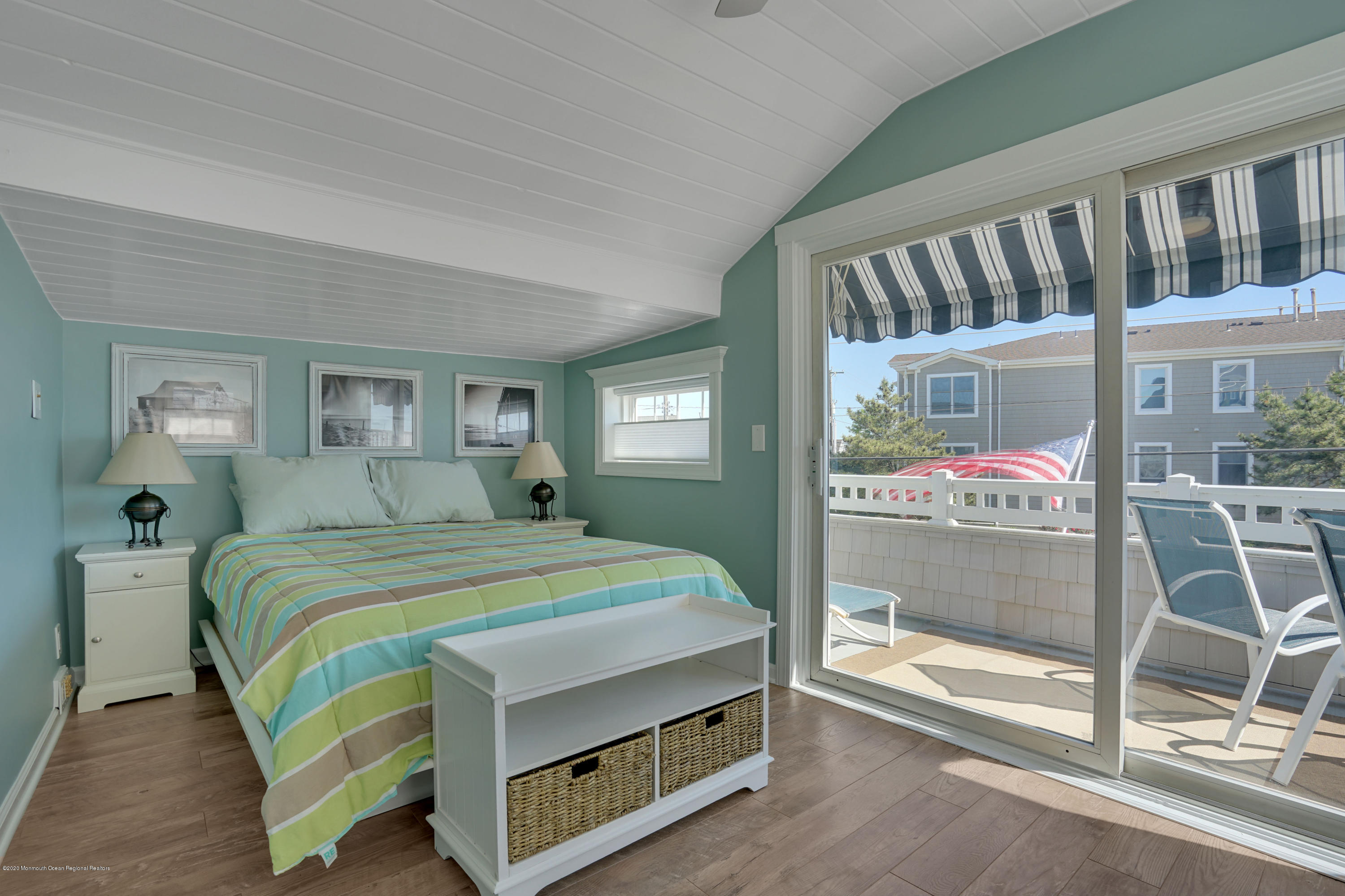 593 Brielle Road Manasquan, NJ 08736 - Photo 17 of 39 a bedroom with a bed next to a window