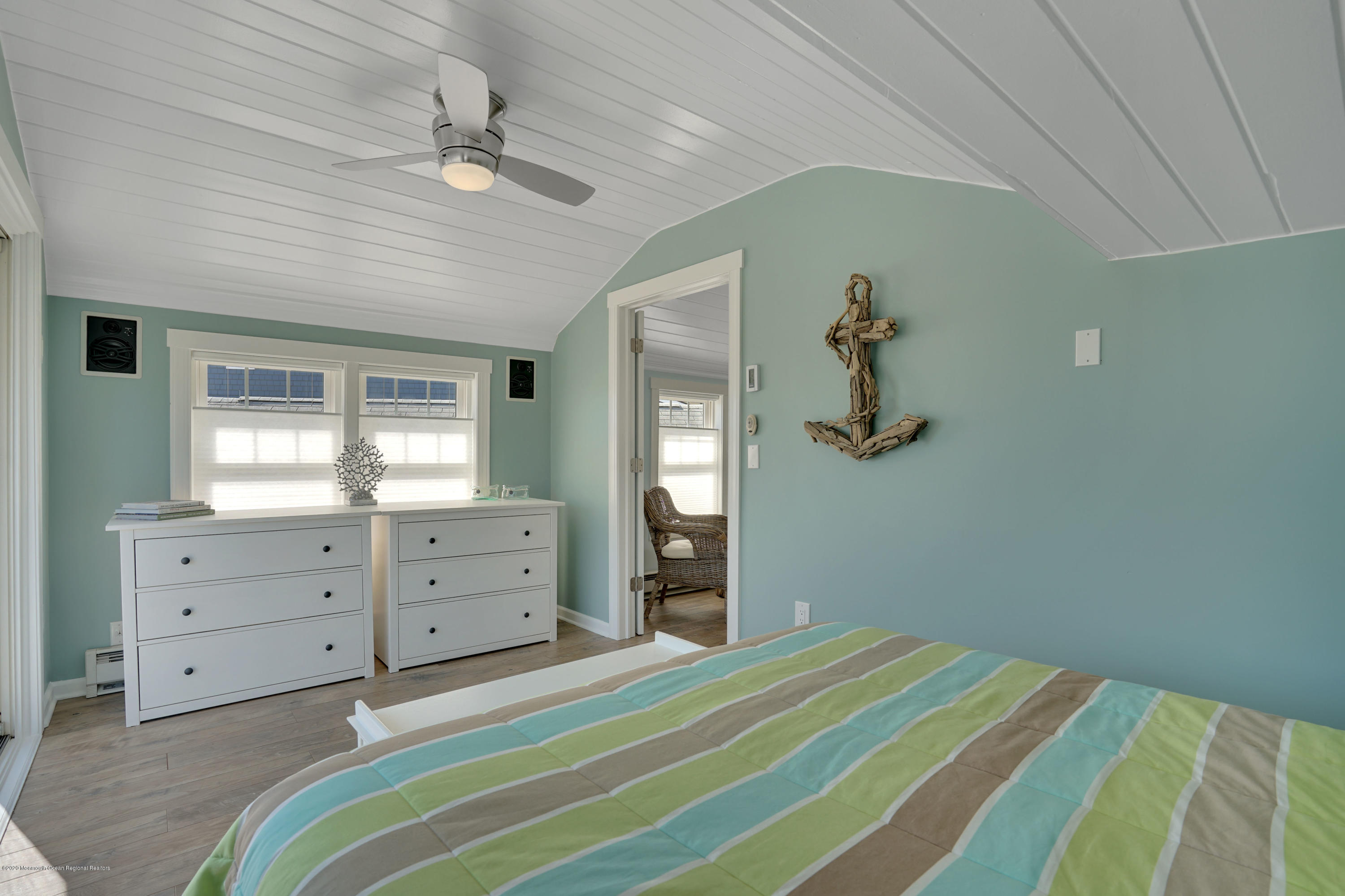593 Brielle Road Manasquan, NJ 08736 - Photo 20 of 39 a bedroom with a bed and a dresser