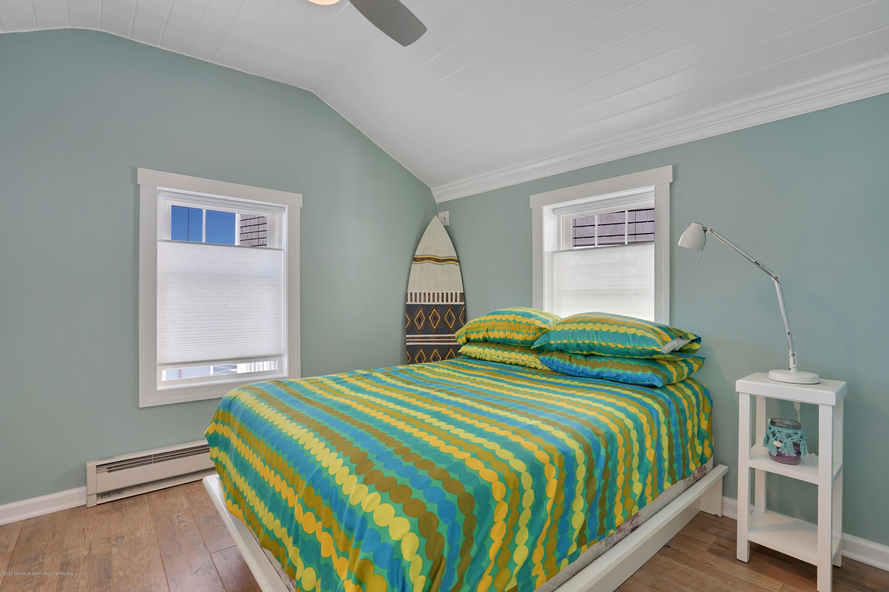 593 Brielle Road Manasquan, NJ 08736 - Photo 24 of 39 a bedroom with a bed and a window