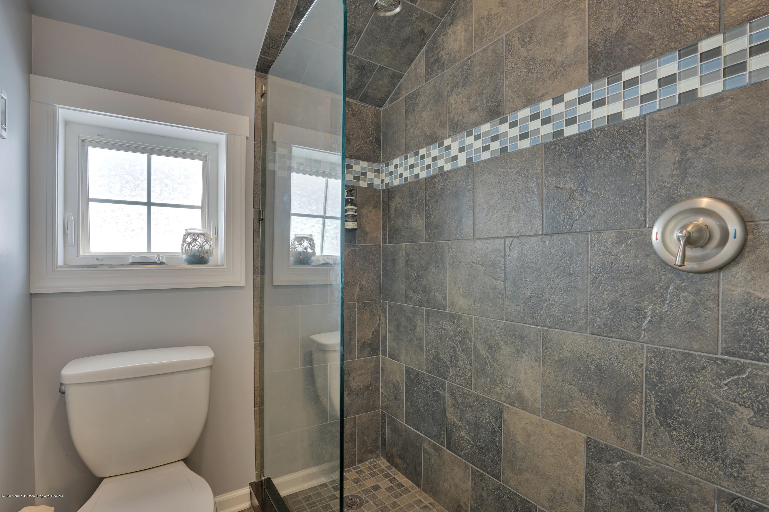 593 Brielle Road Manasquan, NJ 08736 - Photo 27 of 39 a bathroom with a toilet and a shower