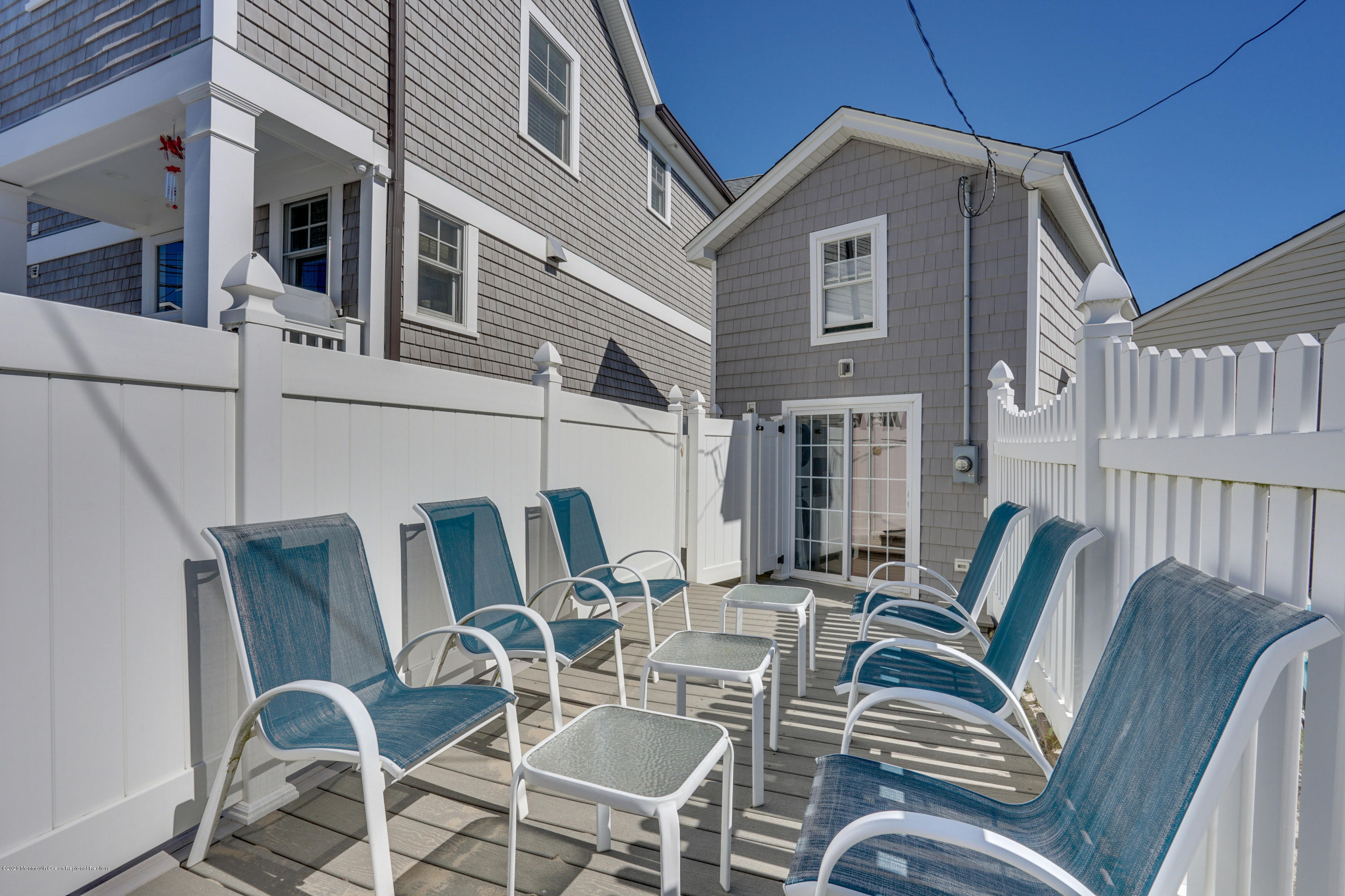593 Brielle Road Manasquan, NJ 08736 - Photo 29 of 39 a view of a patio with couches chairs and potted plants