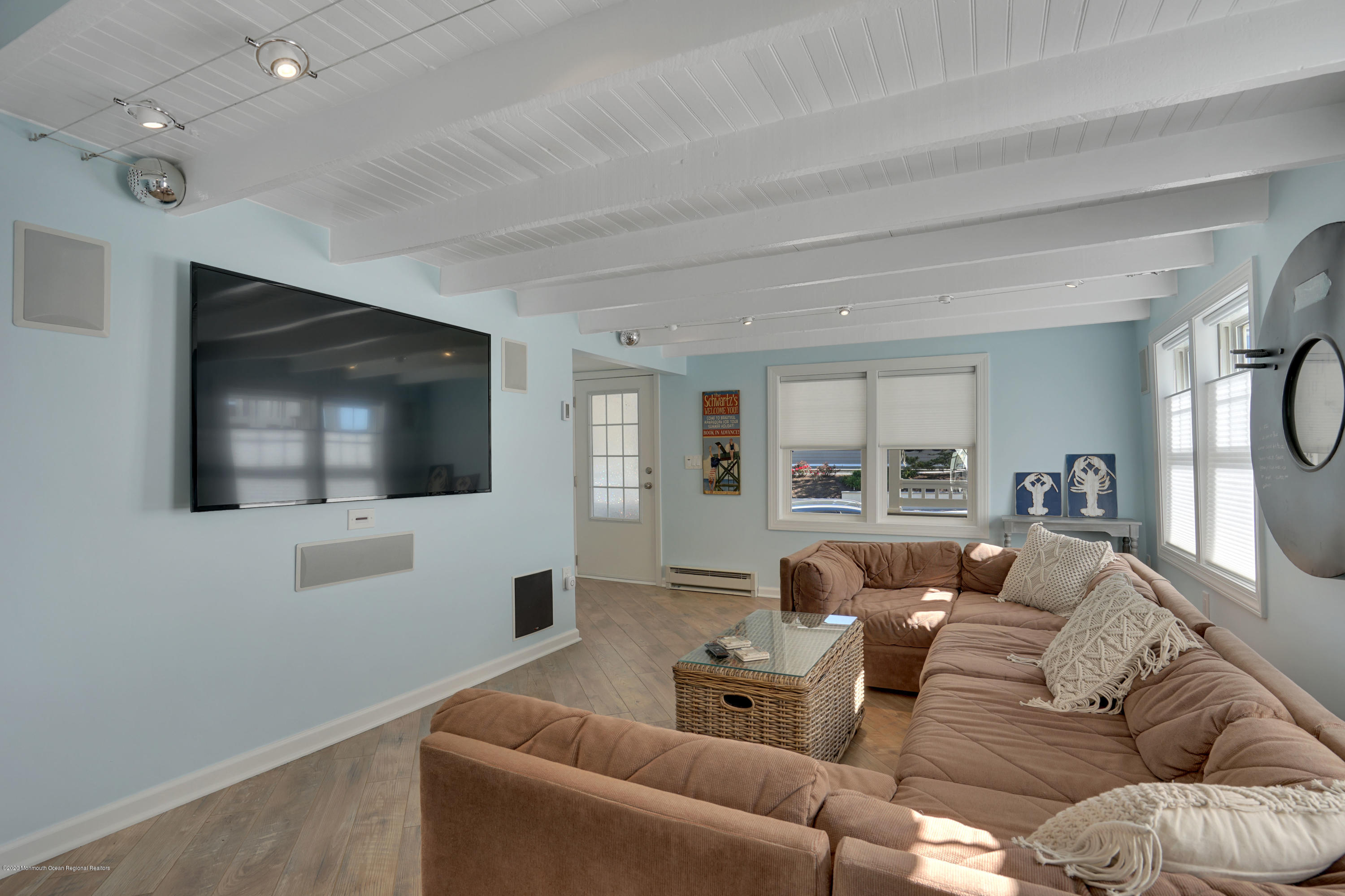 593 Brielle Road Manasquan, NJ 08736 - Photo 7 of 39 a living room with furniture and a flat screen tv