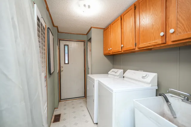 a bedroom with a bed and a television