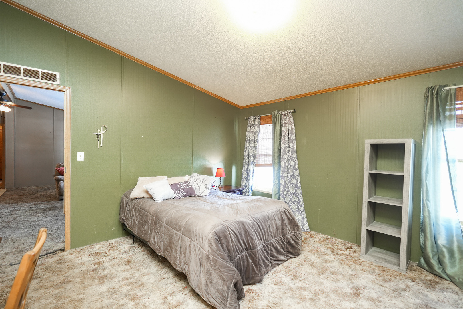 149 Daniel Court Manteno, IL 60950 - Photo 22 of 30 a bedroom with a bed and a television