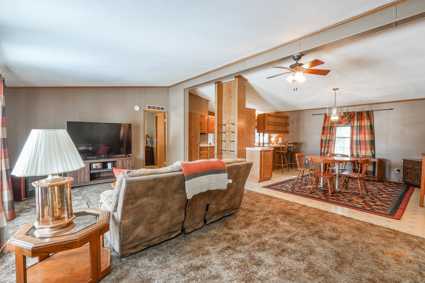 149 Daniel Court Manteno, IL 60950 - Photo 9 of 30 a living room with furniture and a flat screen tv