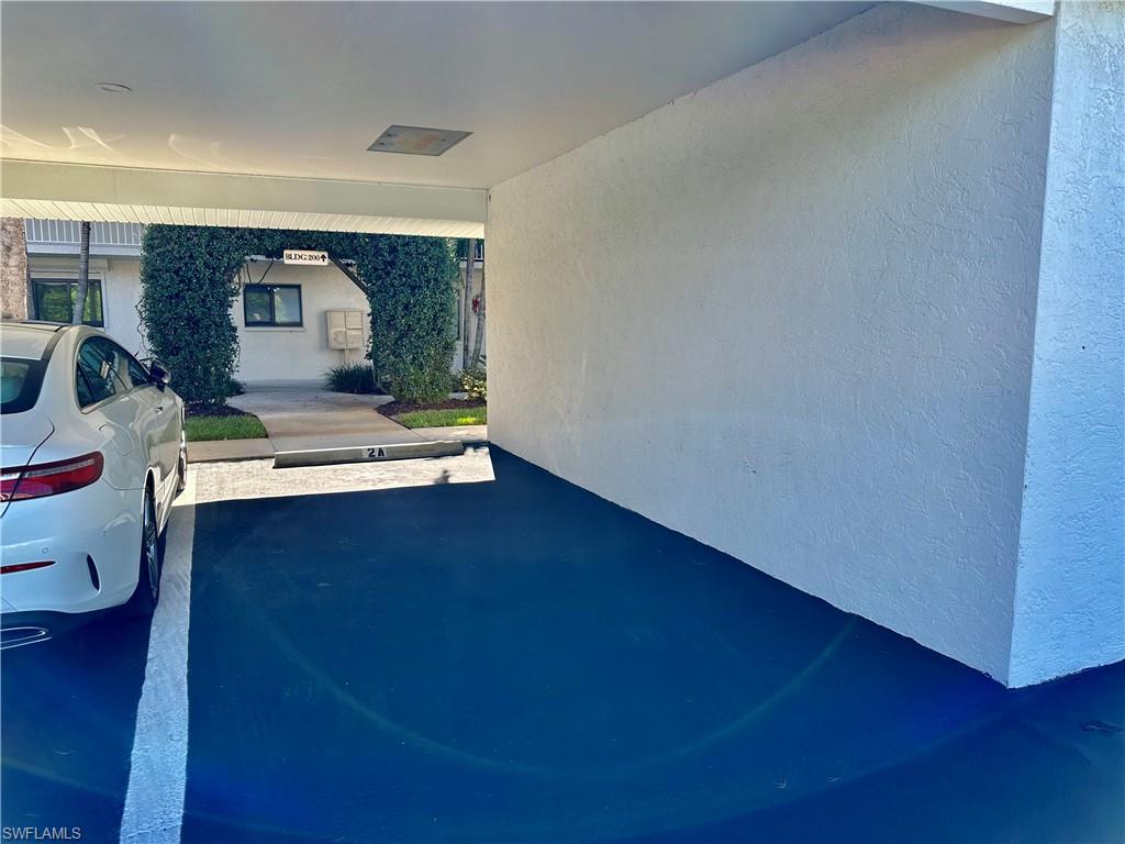 910 Vanderbilt Beach Road, Unit 222 Naples, FL 34108 - Photo 26 of 31 Private Carport