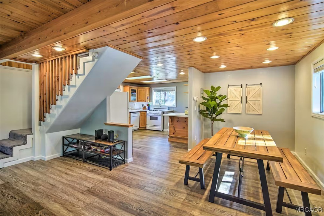 161 Moreno Lane Sugarloaf, CA 92386 - Photo 3 of 14 a living room with furniture dining table and wooden floor
