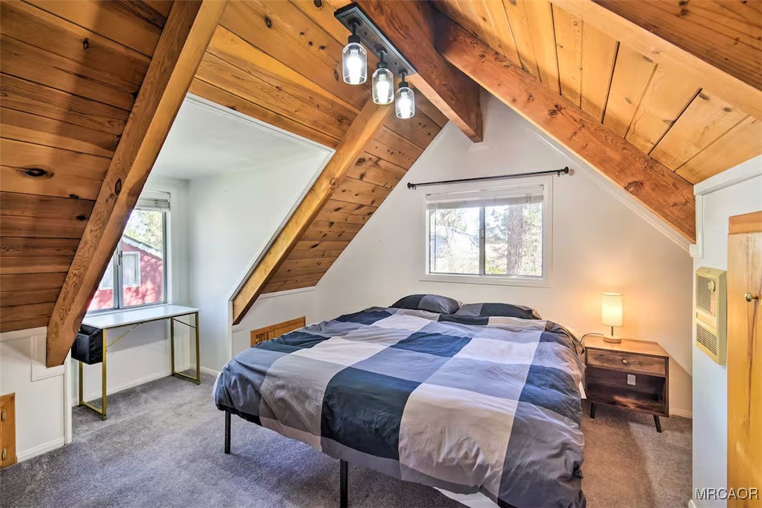 161 Moreno Lane Sugarloaf, CA 92386 - Photo 6 of 14 a bed sitting in a bedroom next to a window