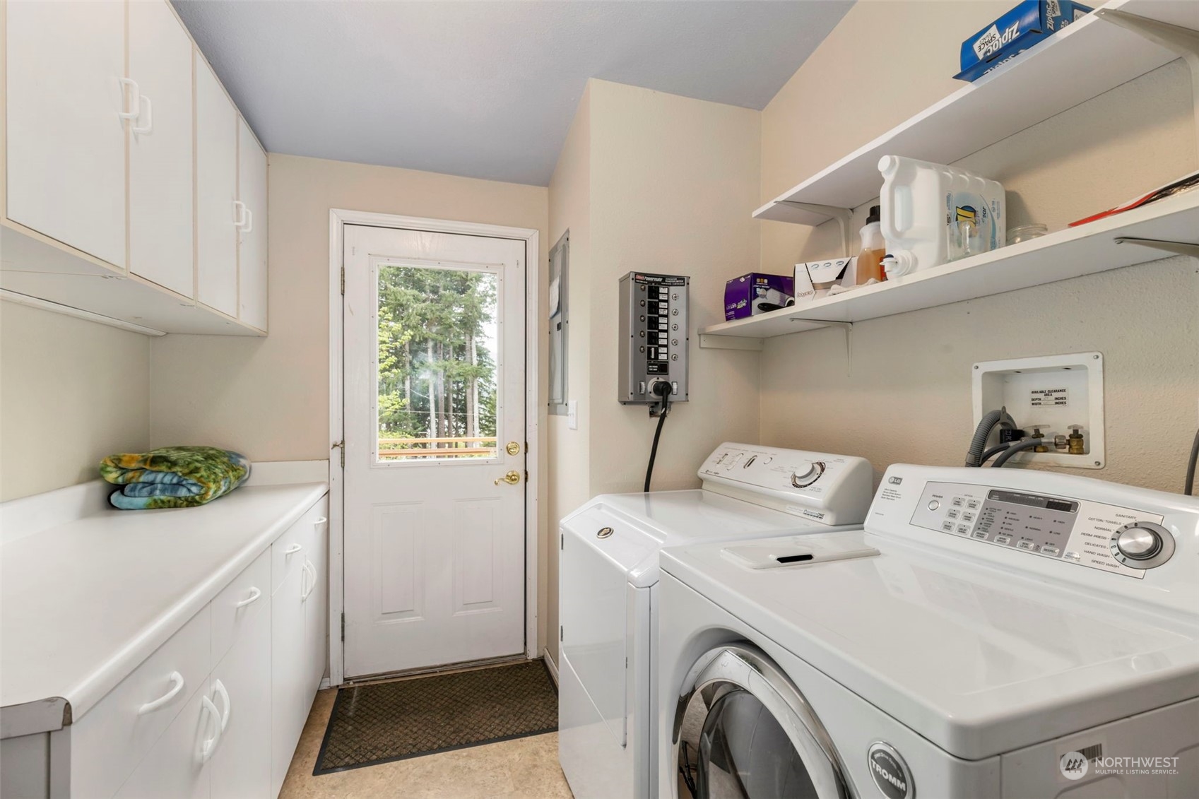 2123 East Quilcene Road Quilcene, WA 98376 - Photo 19 of 37 a utility room with dryer and washer
