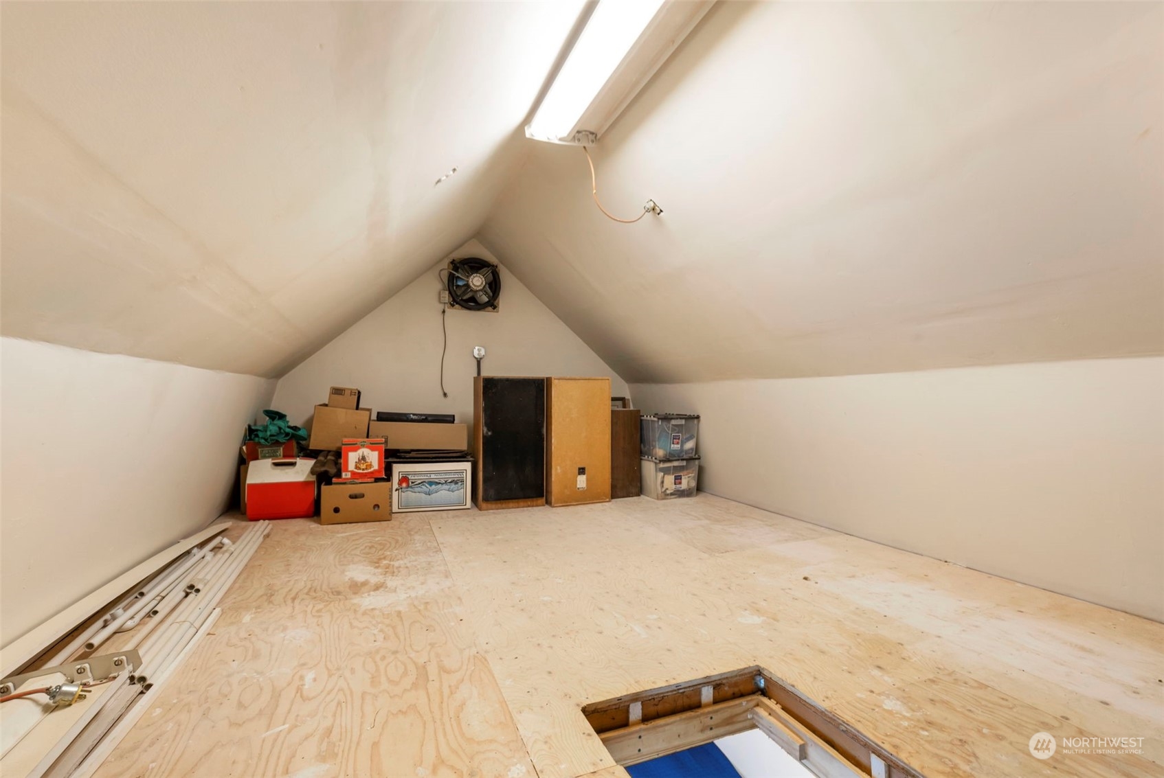 2123 East Quilcene Road Quilcene, WA 98376 - Photo 31 of 37 a storage room with wooden floor and furniture