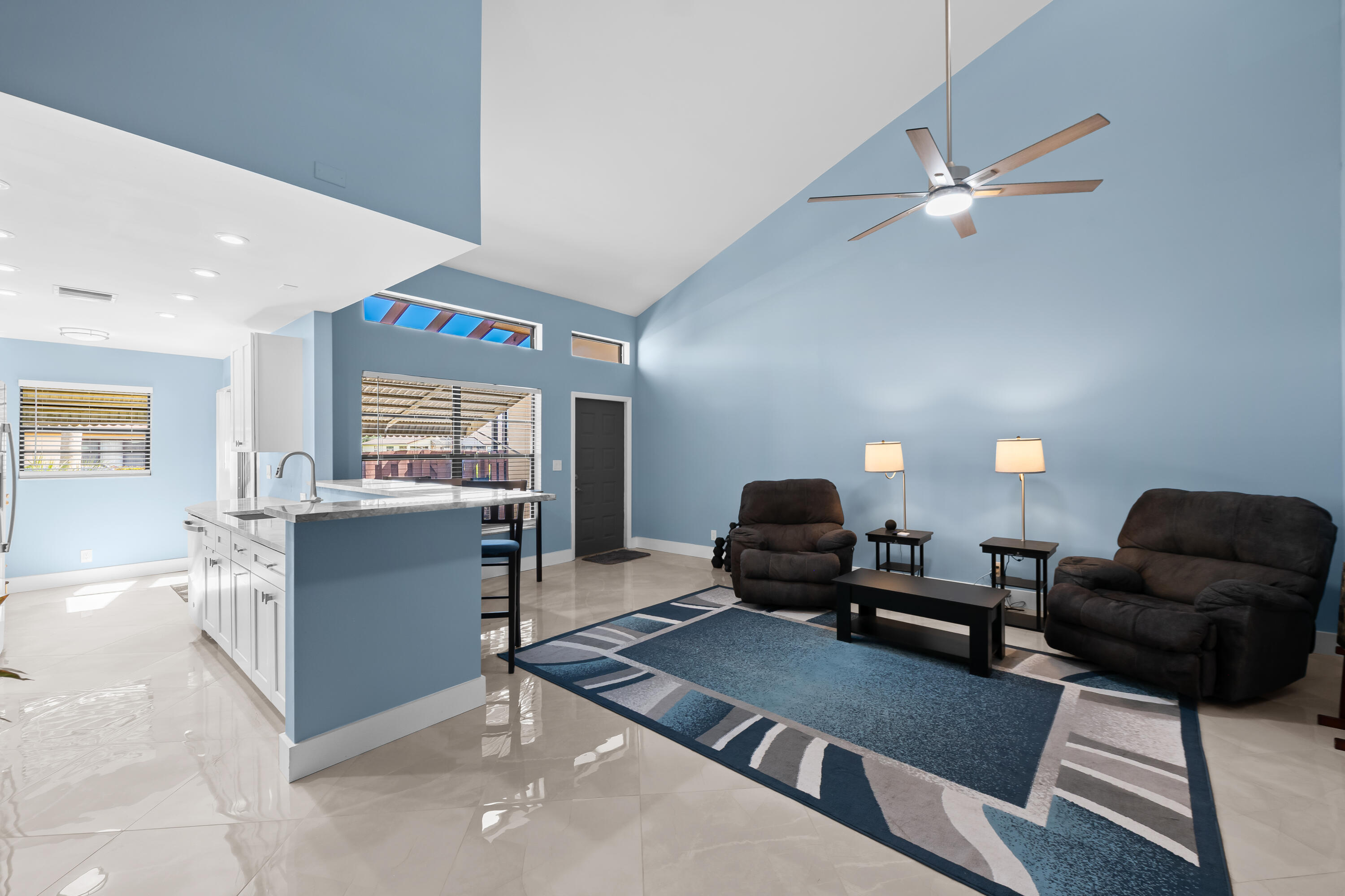 14079 Nesting Way, Unit B Delray Beach, FL 33484 - Photo 7 of 26 a living room with furniture and a window