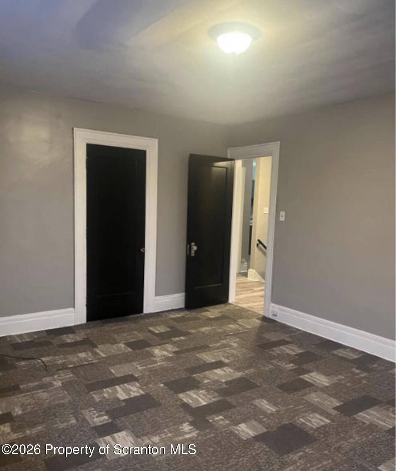 85 Main Street Olyphant, PA 18447 - Photo 17 of 29 a view of an empty room
