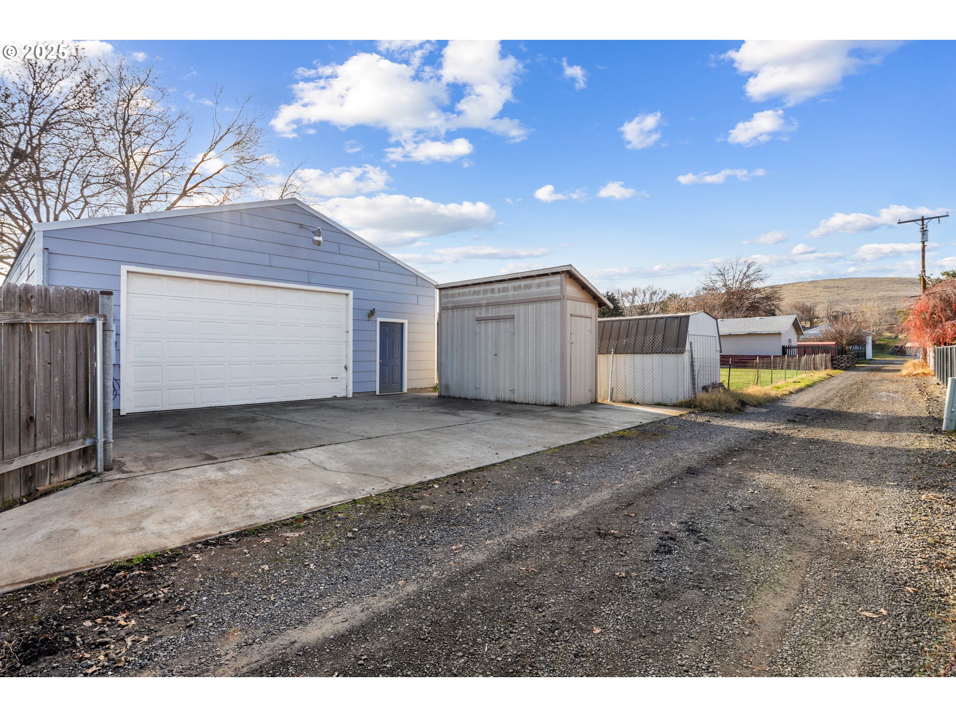 4207 Southwest Sheridan Avenue Pendleton, OR 97801 - Photo 26 of 34 a view of a dry yard with a house