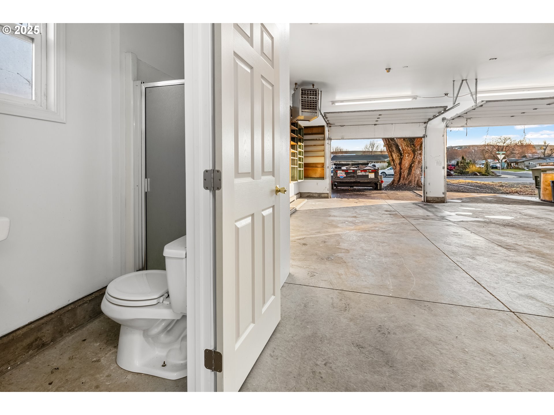 4207 Southwest Sheridan Avenue Pendleton, OR 97801 - Photo 28 of 34 a bathroom with a toilet and a shower