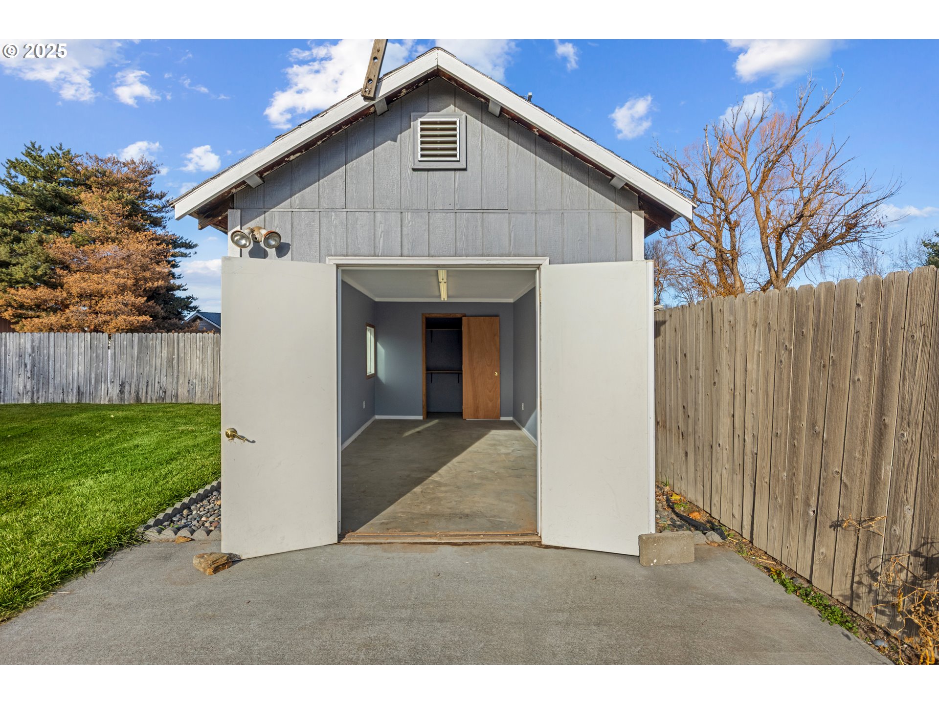 4207 Southwest Sheridan Avenue Pendleton, OR 97801 - Photo 32 of 34 a view of backyard of house with wooden fence