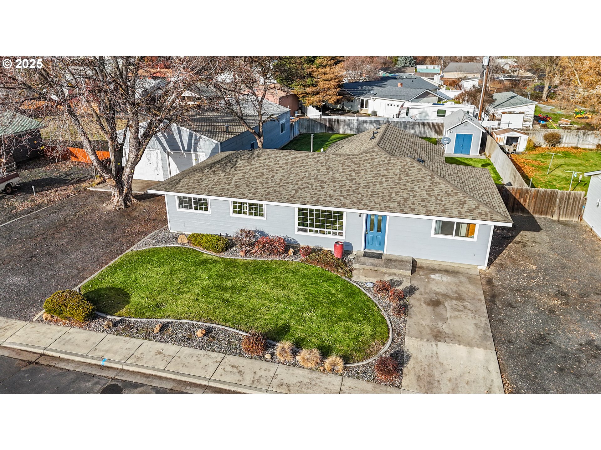 4207 Southwest Sheridan Avenue Pendleton, OR 97801 - Photo 5 of 34 a picture of a house and a yard