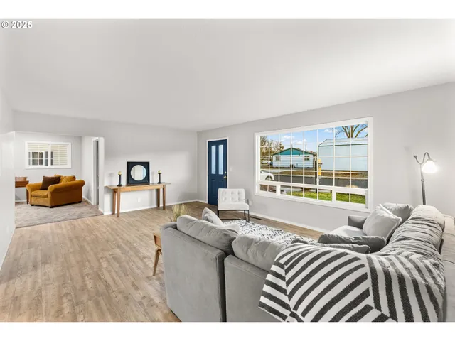 a living room with furniture and a couch