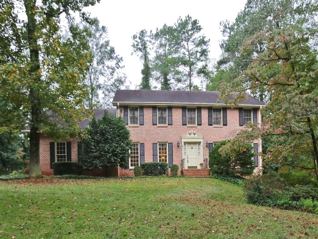 927 John Alden Road Stone Mountain, GA 30083 - Photo 1 of 1 Stately brick traditional. Side-entry garage!