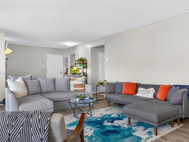 a living room with furniture and a couch