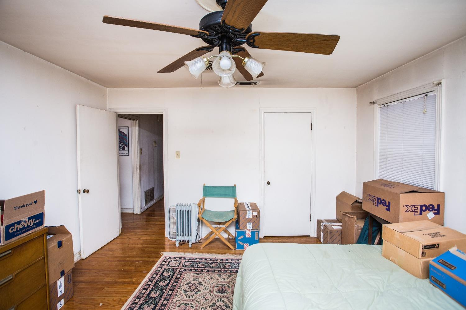 2422 33rd Street Lubbock, TX 79411 - Photo 28 of 35 a bedroom with furniture and a rug