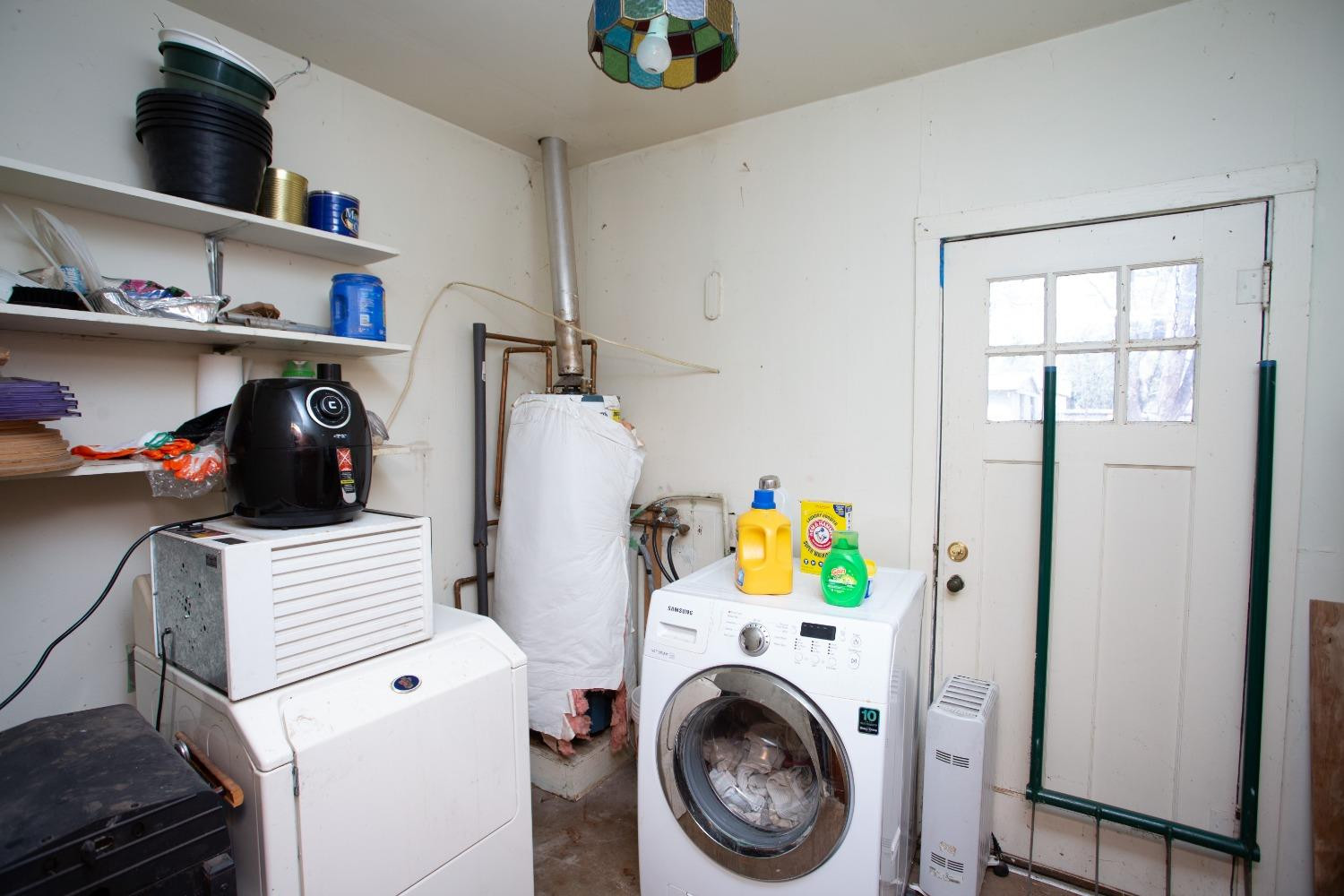 2422 33rd Street Lubbock, TX 79411 - Photo 31 of 35 a view of storage and utility room with baby toys