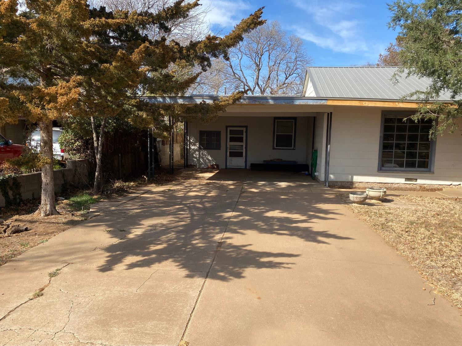 2422 33rd Street Lubbock, TX 79411 - Photo 4 of 35 a view of a house with a patio