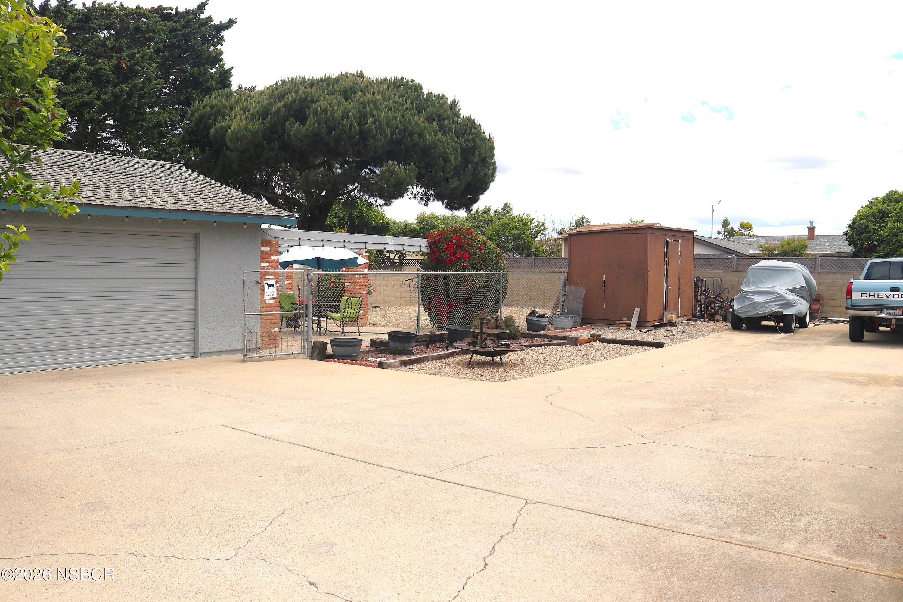 812 North D Street Lompoc, CA 93436 - Photo 26 of 34 Backyard Parking & 2 Car Garage