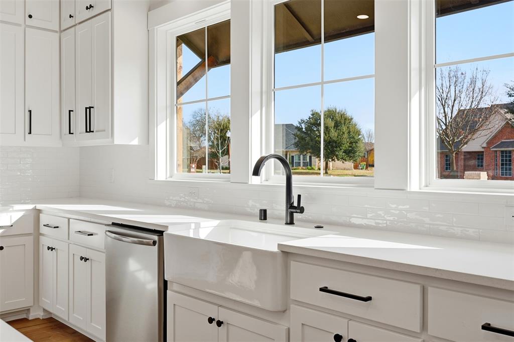 509 Emma Lane Grandview, TX 76050 - Photo 17 of 36 a sink with a window