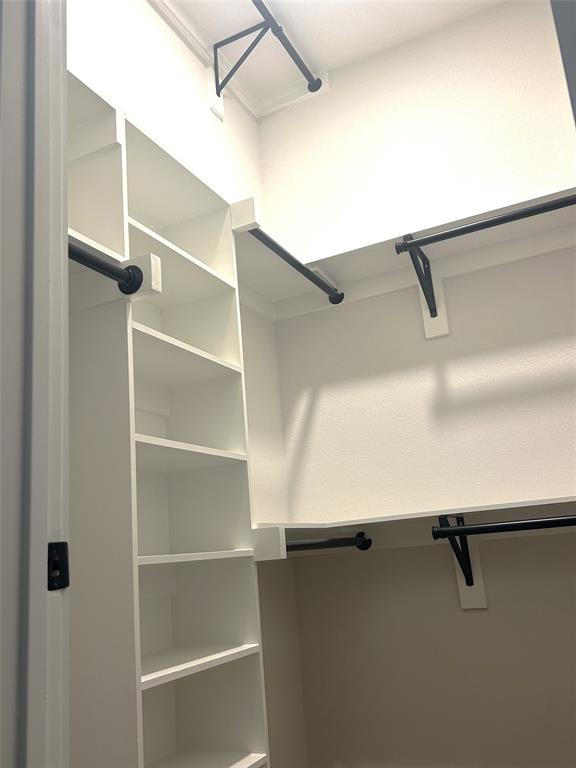 509 Emma Lane Grandview, TX 76050 - Photo 29 of 35 a view of a room with racks on the wall