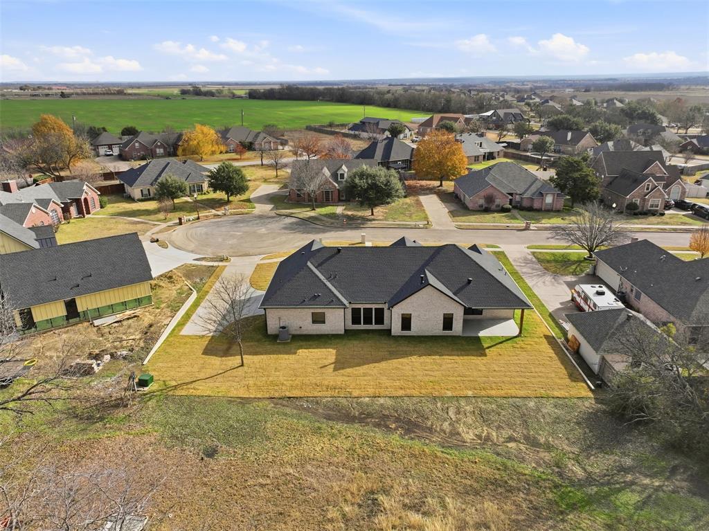 509 Emma Lane Grandview, TX 76050 - Photo 3 of 36 an aerial view of a house with a ocean view
