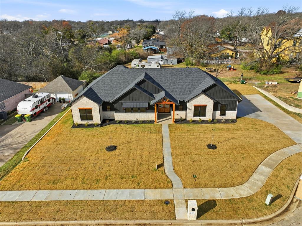 509 Emma Lane Grandview, TX 76050 - Photo 7 of 35 a aerial view of a house with a yard
