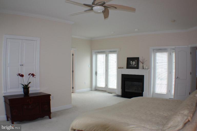 2124 Dixon Road Frederick, MD 21704 - Photo 14 of 30 a living room with furniture a fireplace and a window