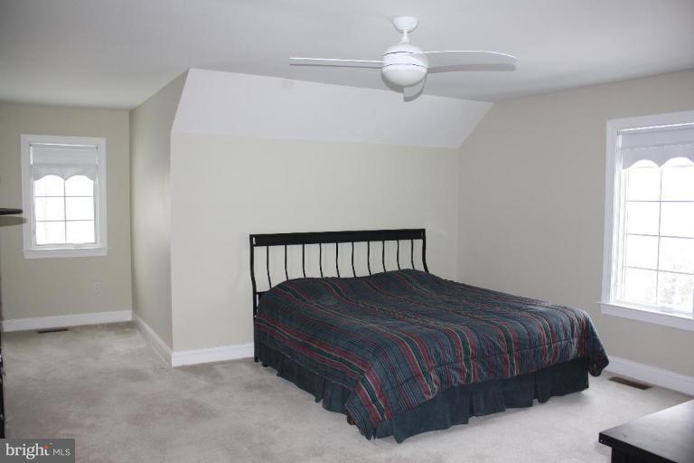 2124 Dixon Road Frederick, MD 21704 - Photo 28 of 30 a bedroom with a bed and window