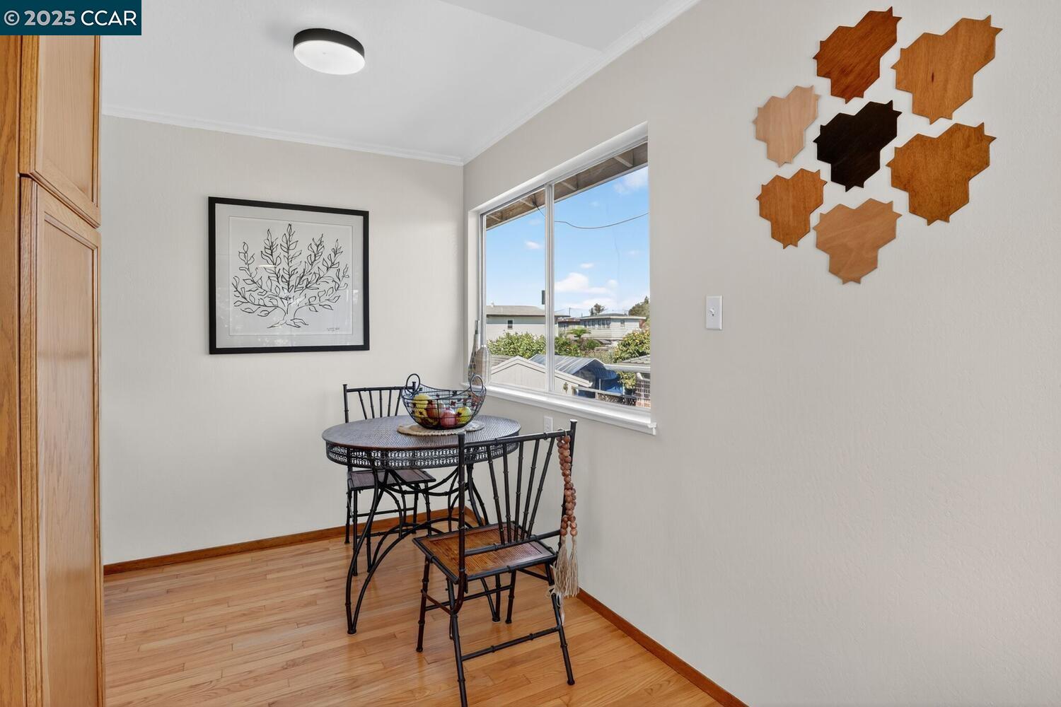 1601 Broadway, Unit 9 Alameda, CA 94501 - Photo 14 of 30 a view of a workspace with furniture and wooden floor