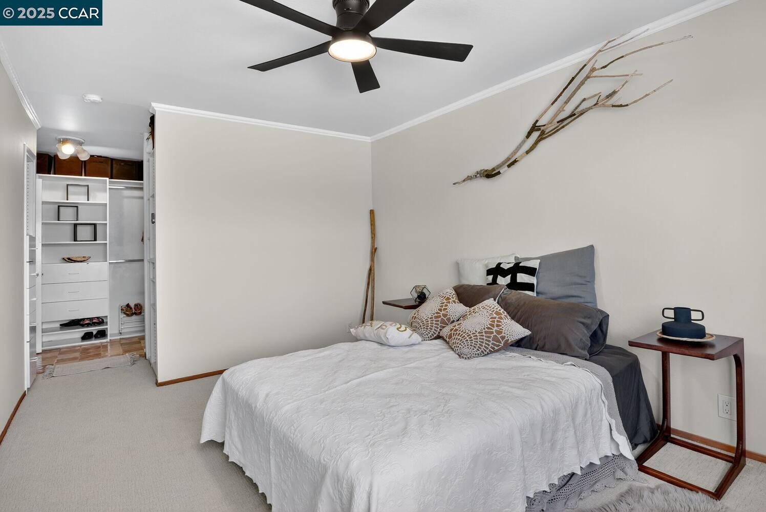 1601 Broadway, Unit 9 Alameda, CA 94501 - Photo 18 of 30 a bedroom with a bed and a walk in closet