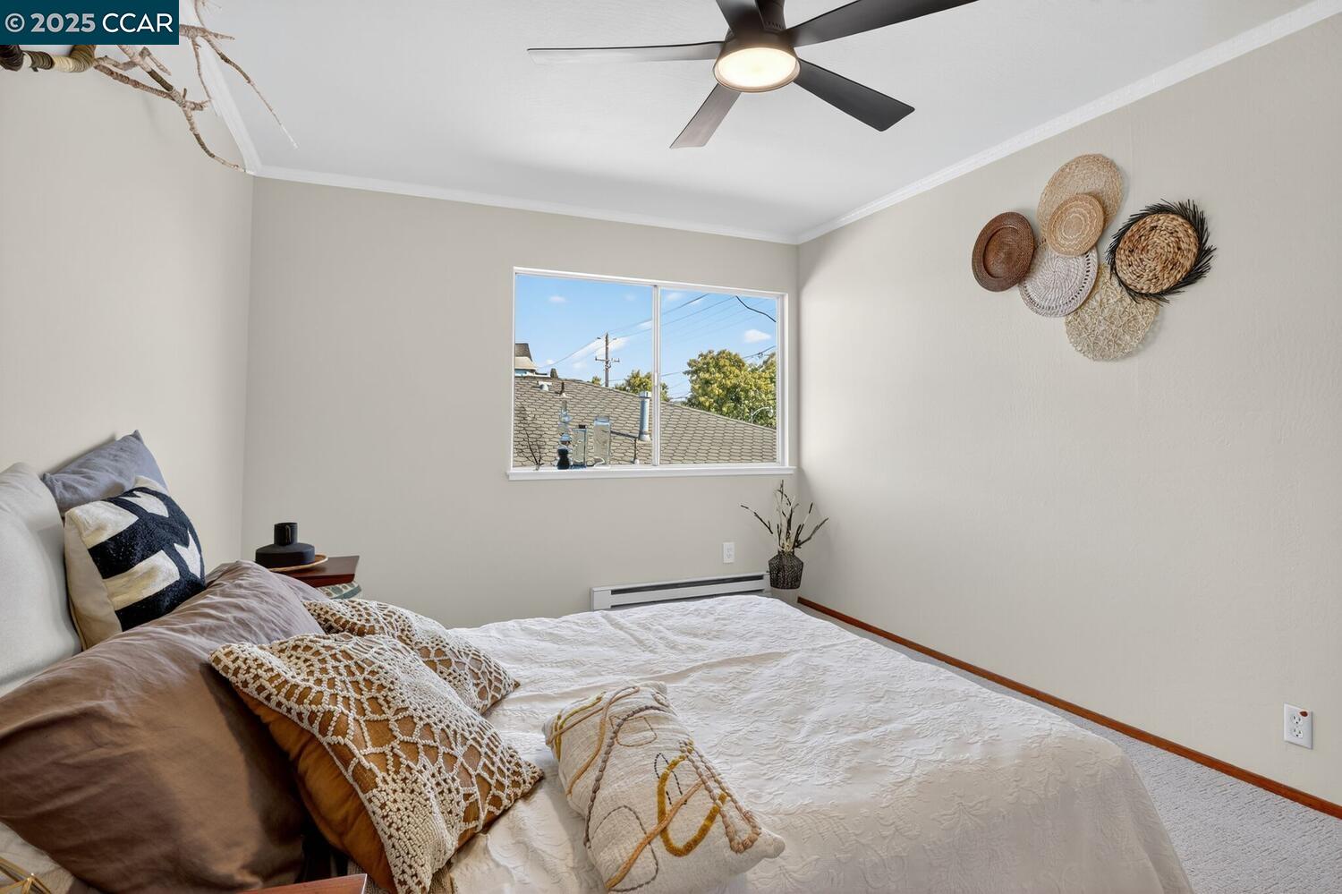 1601 Broadway, Unit 9 Alameda, CA 94501 - Photo 20 of 30 a bedroom with a bed and a window