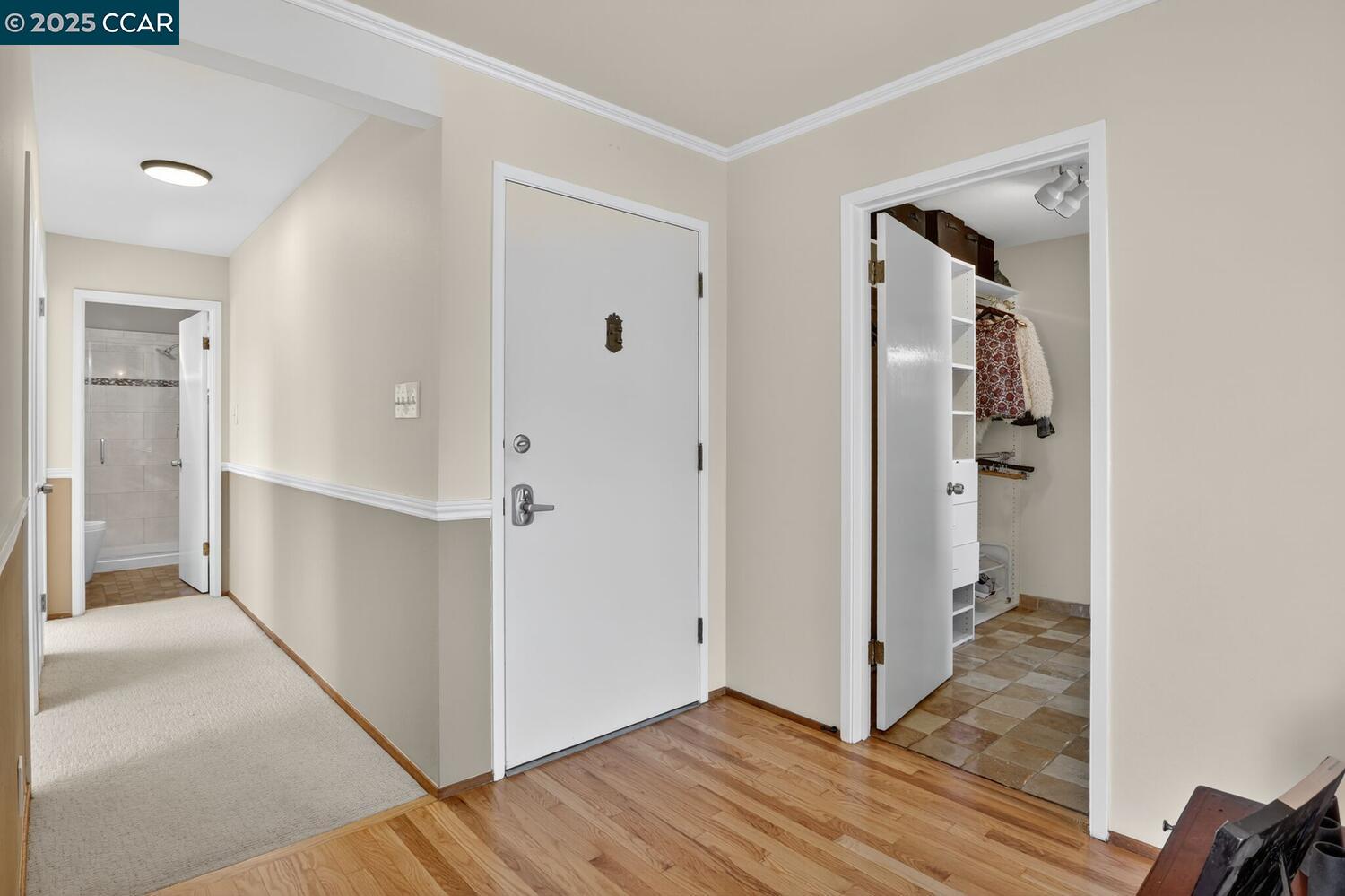 1601 Broadway, Unit 9 Alameda, CA 94501 - Photo 22 of 30 a view of a hallway with wooden floor and closet