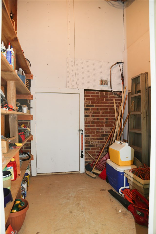 1520 Edgeside Court Raleigh, NC 27609 - Photo 23 of 30 storage room with acess to walkin crawlspace