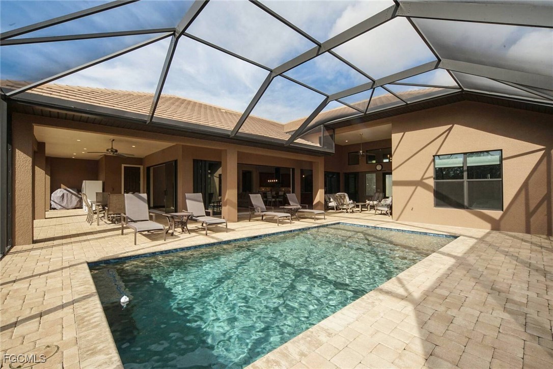 6142 Calusa Rdg Trail Bokeelia, FL 33922 - Photo 24 of 43 a view of a house with sitting area and furniture