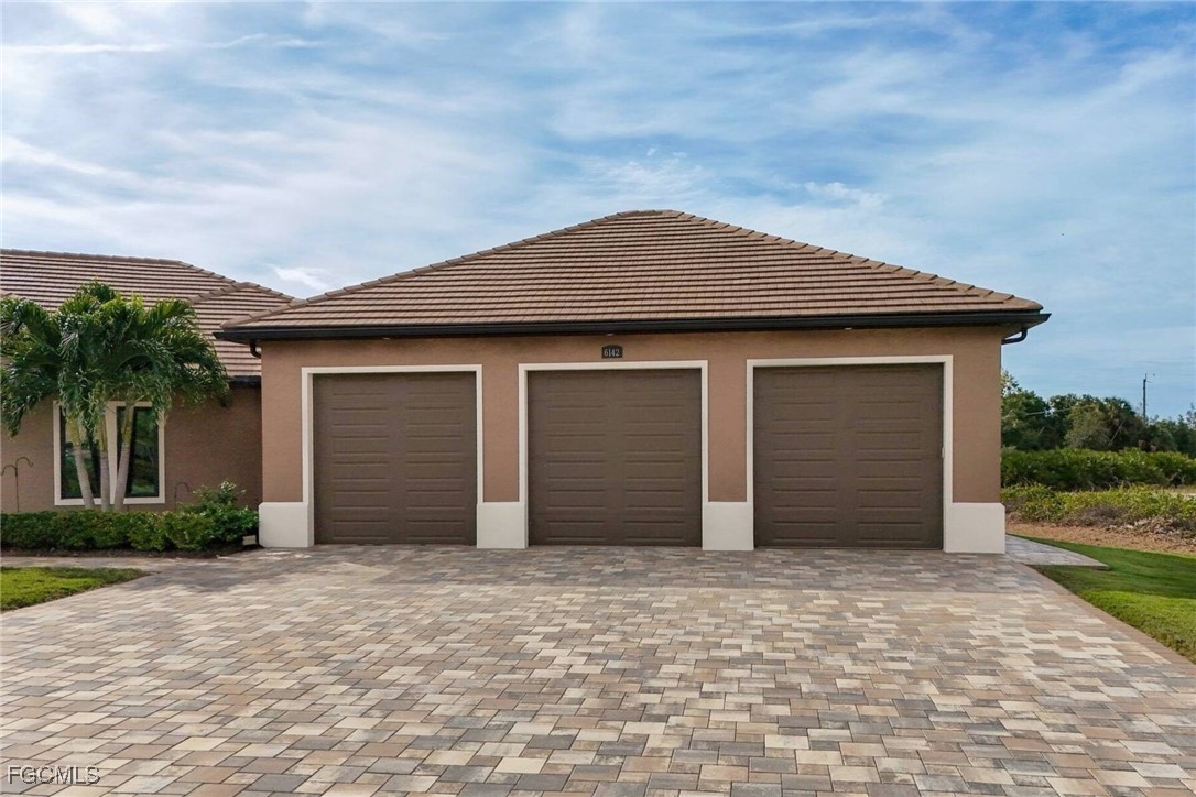 6142 Calusa Rdg Trail Bokeelia, FL 33922 - Photo 27 of 43 front view of a house