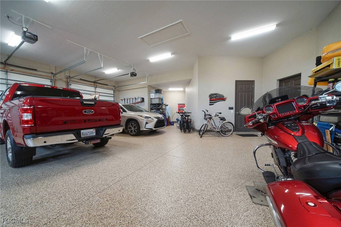 6142 Calusa Rdg Trail Bokeelia, FL 33922 - Photo 30 of 43 a view of car garage