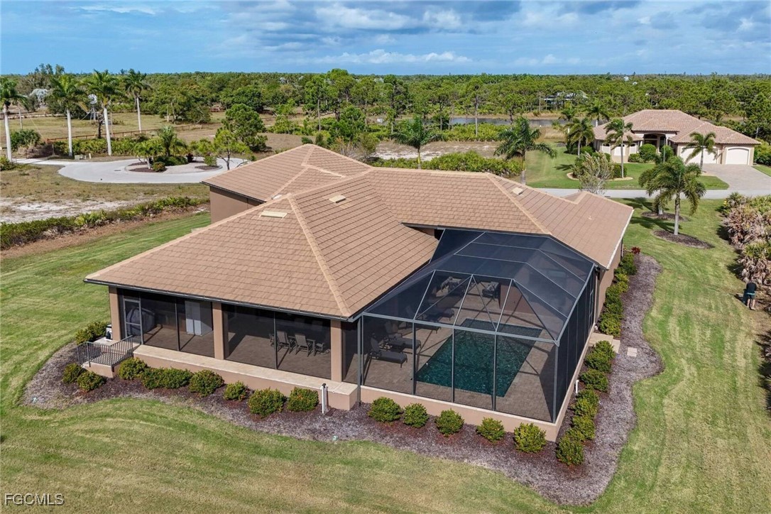 6142 Calusa Rdg Trail Bokeelia, FL 33922 - Photo 31 of 43 an aerial view of a house